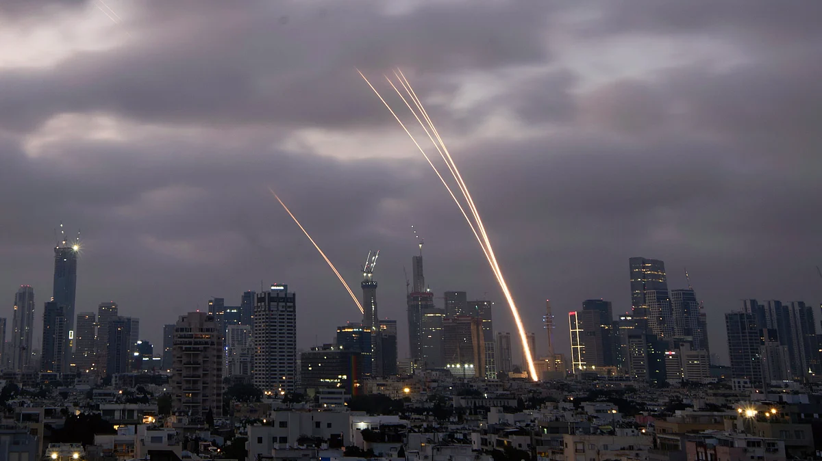 Israel's Iron Dome air defence system intercepts projectiles over Tel Aviv on 14 June (photo: AP/PTI)