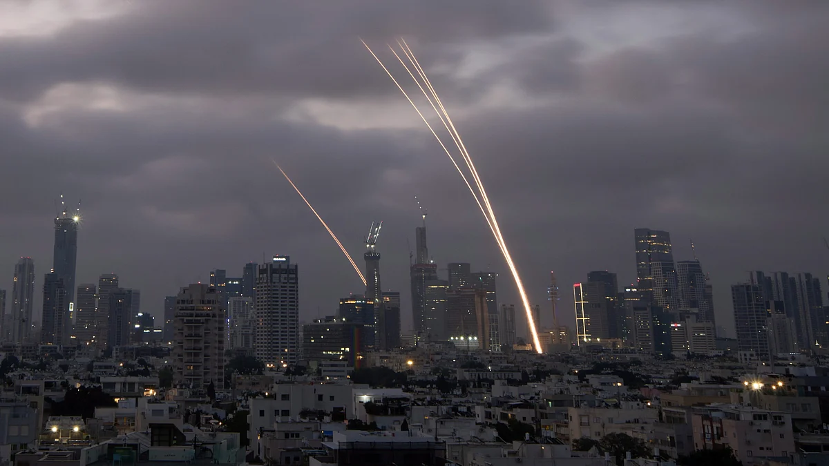 Israeli Iron Dome air defense system fires to intercept projectiles over Tel Aviv (photo: AP/PTI)