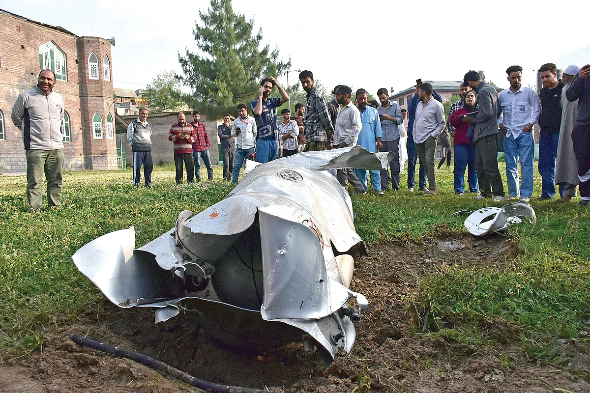 Wreckage of an unknown aircraft in J&K’s Pampore, 7 May (photo: Getty Images)