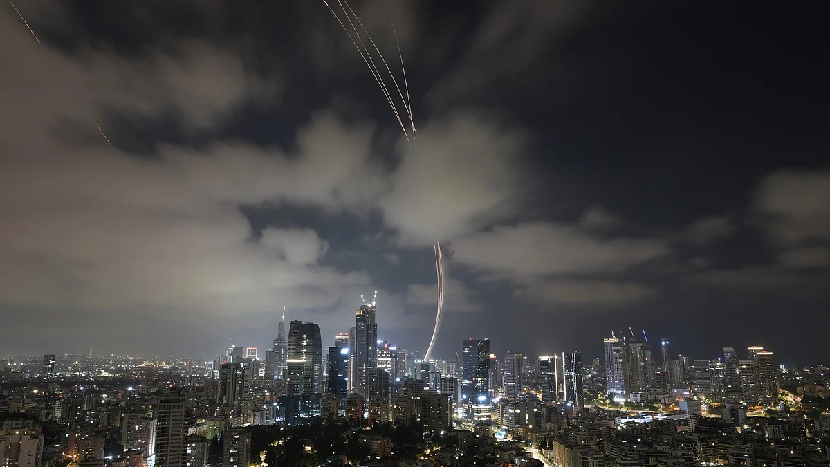 Israel's air defense system intercepts missiles launched over Tel Aviv on 15 June (photo: AP/PTI)