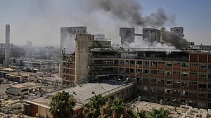 Smoke rises from Soroka hospital building in Beersheba, Israel, on 19 June (photo: AP/PTI)