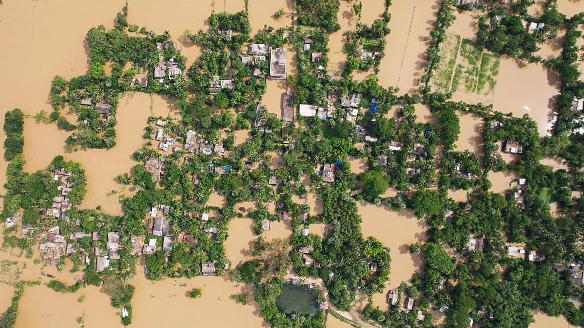 A low-lying area flooded in Balasore on 21 June (photo: PTI) 