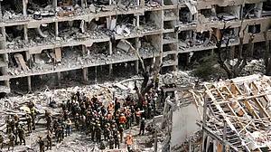 Rescue workers at the site of an Iranian missile strike in Tel Aviv, Israel, on 22 June (photo: AP/PTI)