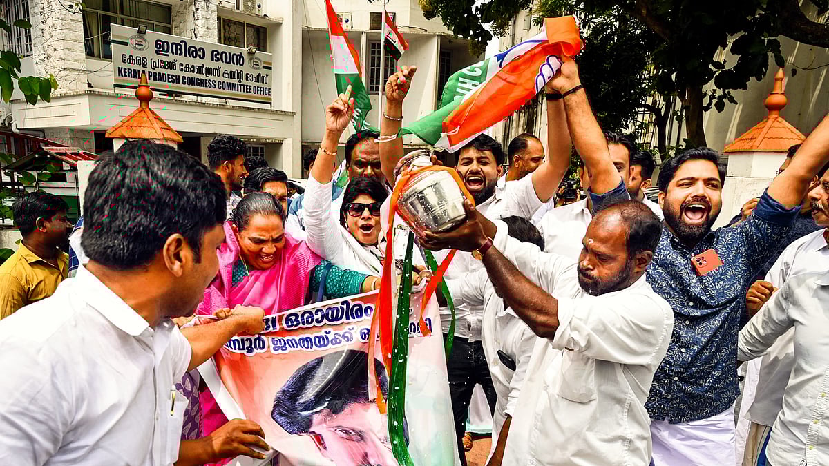 Congress workers celebrate the victory of Aryadan Shoukath in the Nilambur assembly by-election