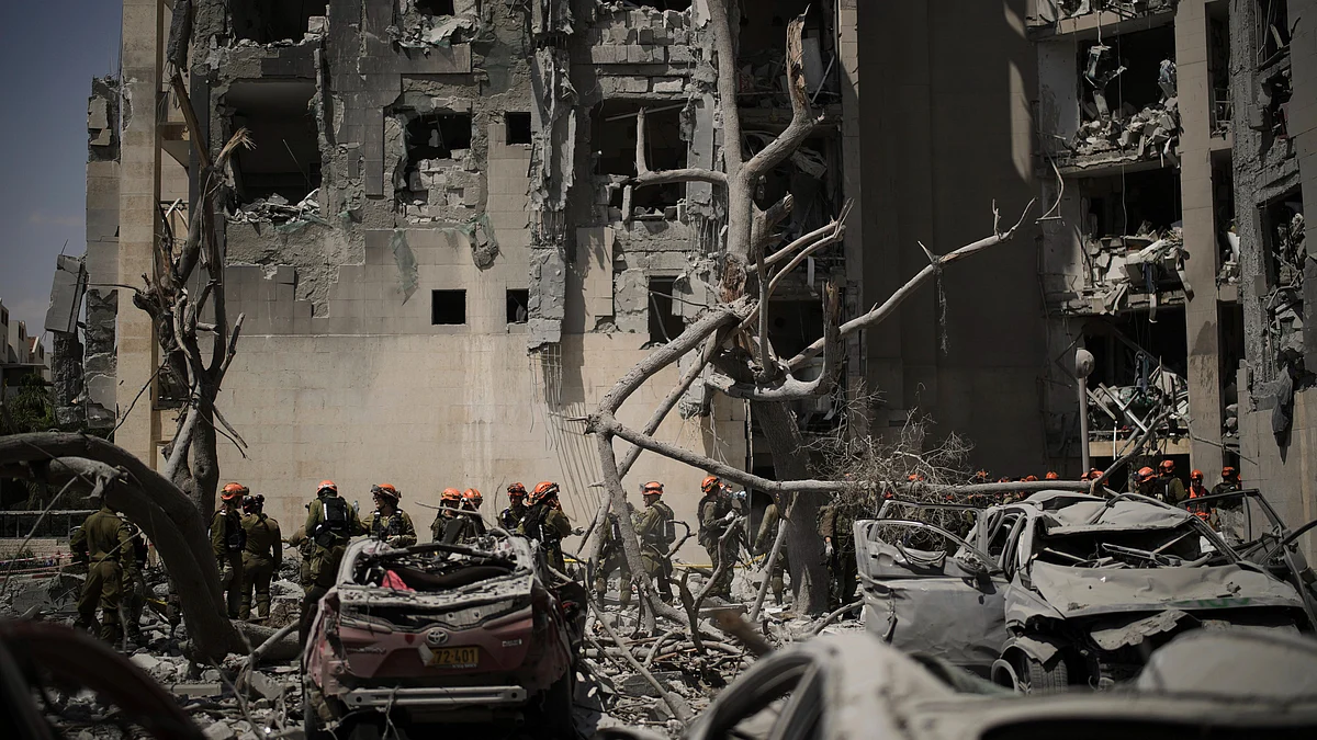 Israeli soldiers work at a site in Beersheba on 24 June (photo: AP/PTI)