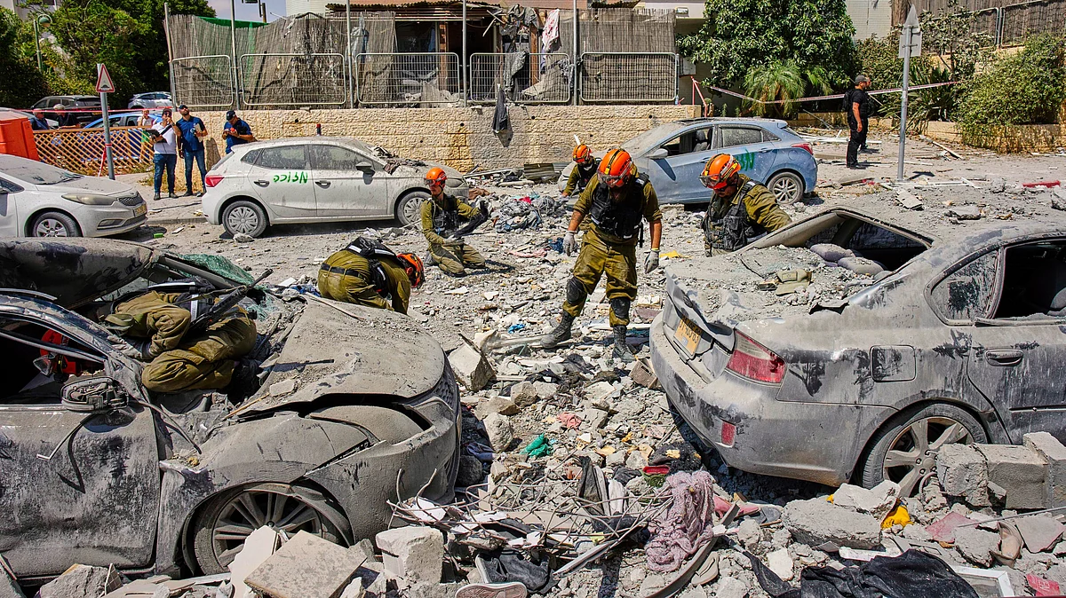 Israeli soldiers in Beersheba, where an Iranian missile strike killed several (photo: AP/PTI)