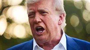 Trump speaks to media on the South Lawn of the White House, 24 June (photo: AP/PTI)