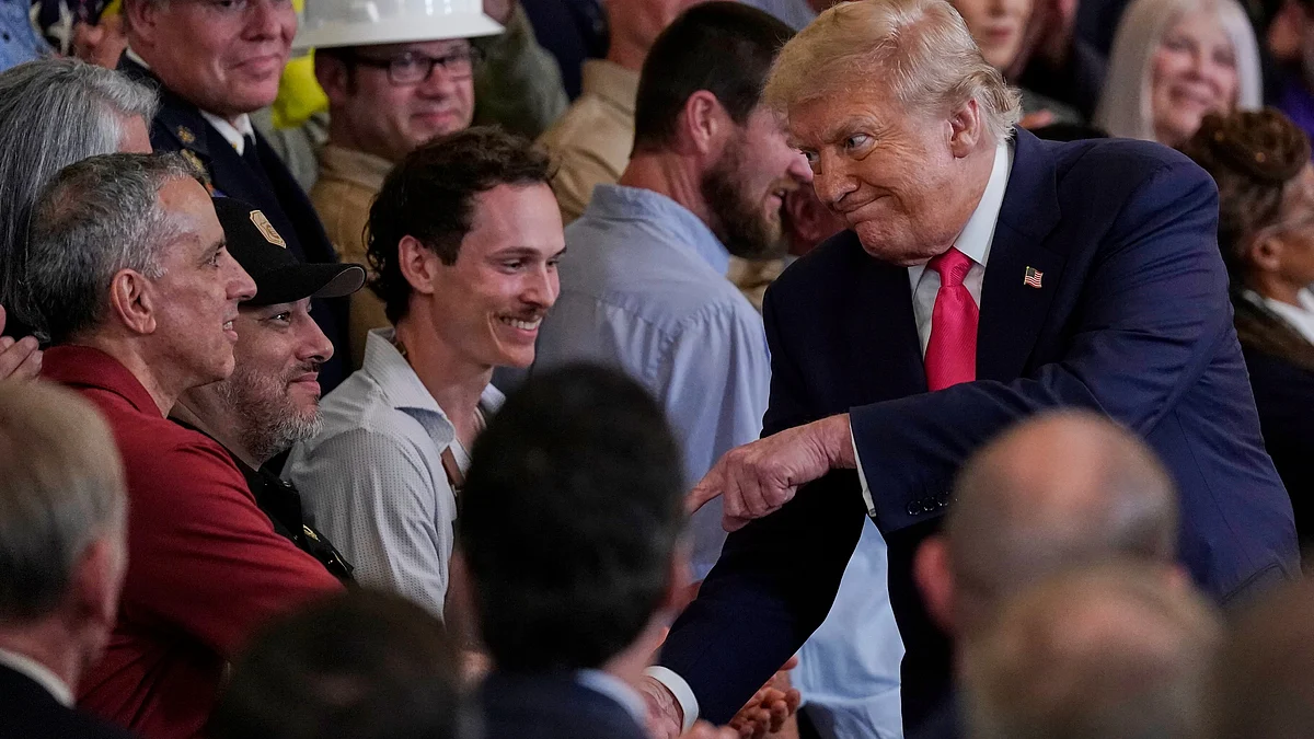 Donald Trump greets people after speaking at an event in White House on 26 June (photo: AP/PTI)