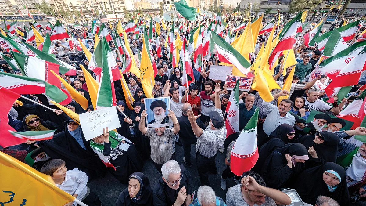 Iranians celebrate ceasefire with the US and Israel after a 12-day war, Tehran, 24 June 2025