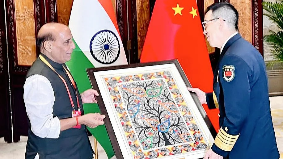 Rajnath Singh with Dong Jun (photo: @DefenceMinIndia/X)