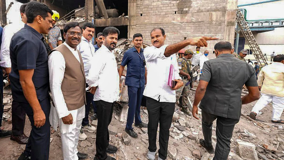 CM A. Revanth Reddy during an inspection at pharma plant site in Sangareddy on 1 July (photo: PTI)