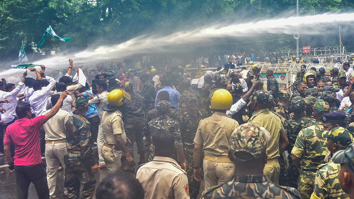 Police deploy water cannons during a BJD demonstration over the harassed student's death