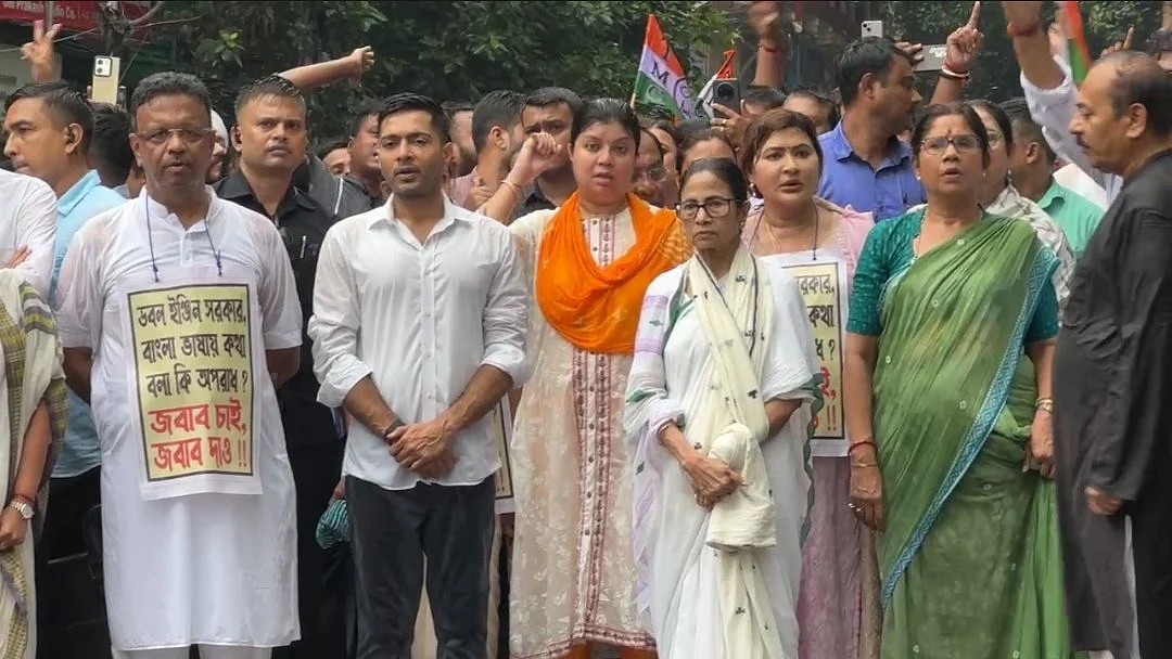 West Bengal CM Mamata Banerjee leads a Trinamool Congress rally against the BJP’s anti-Bengali policies