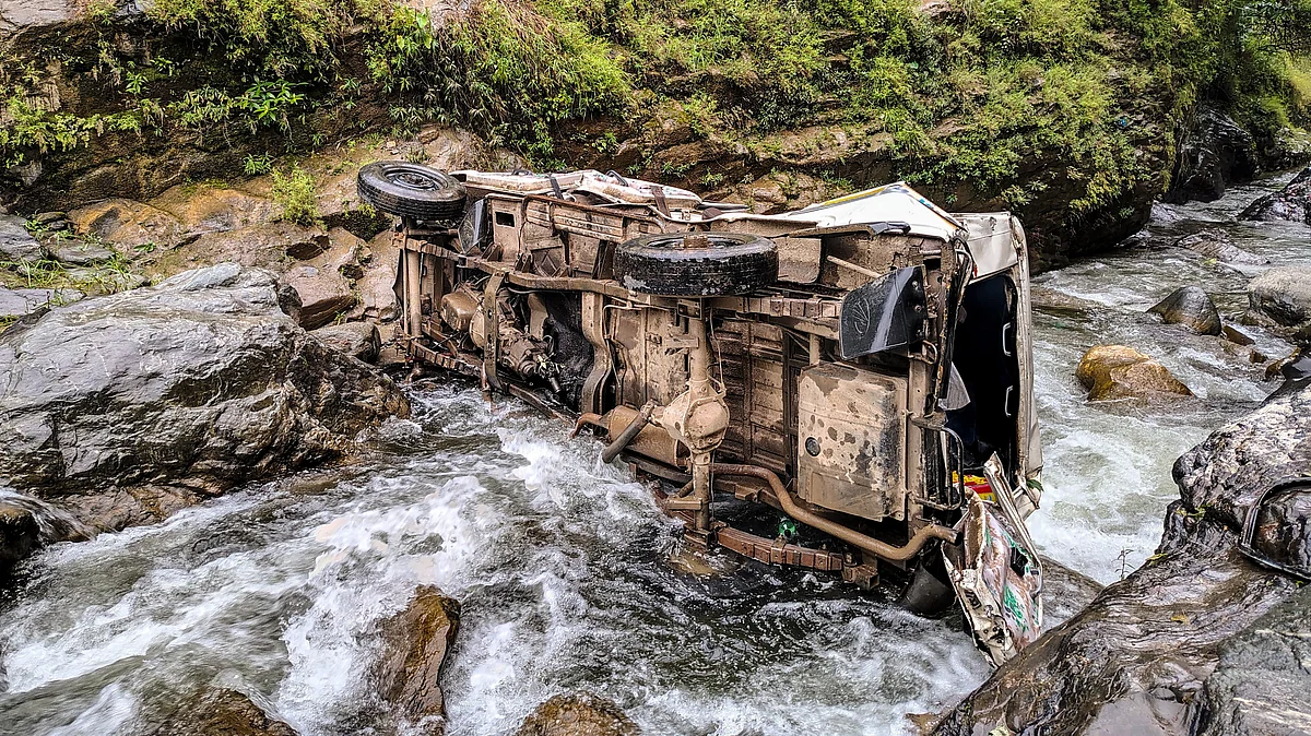 The damaged vehicle at Suni village in Pithoragarh on 15 July (photo: PTI)