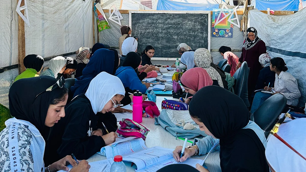 At Gaza's School Without Borders, in a tent, children still try to keep up with their studies