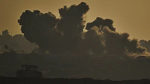 Smoke rises after an Israeli airstrike in Gaza Strip on 18 July (photo: AP/PTI)