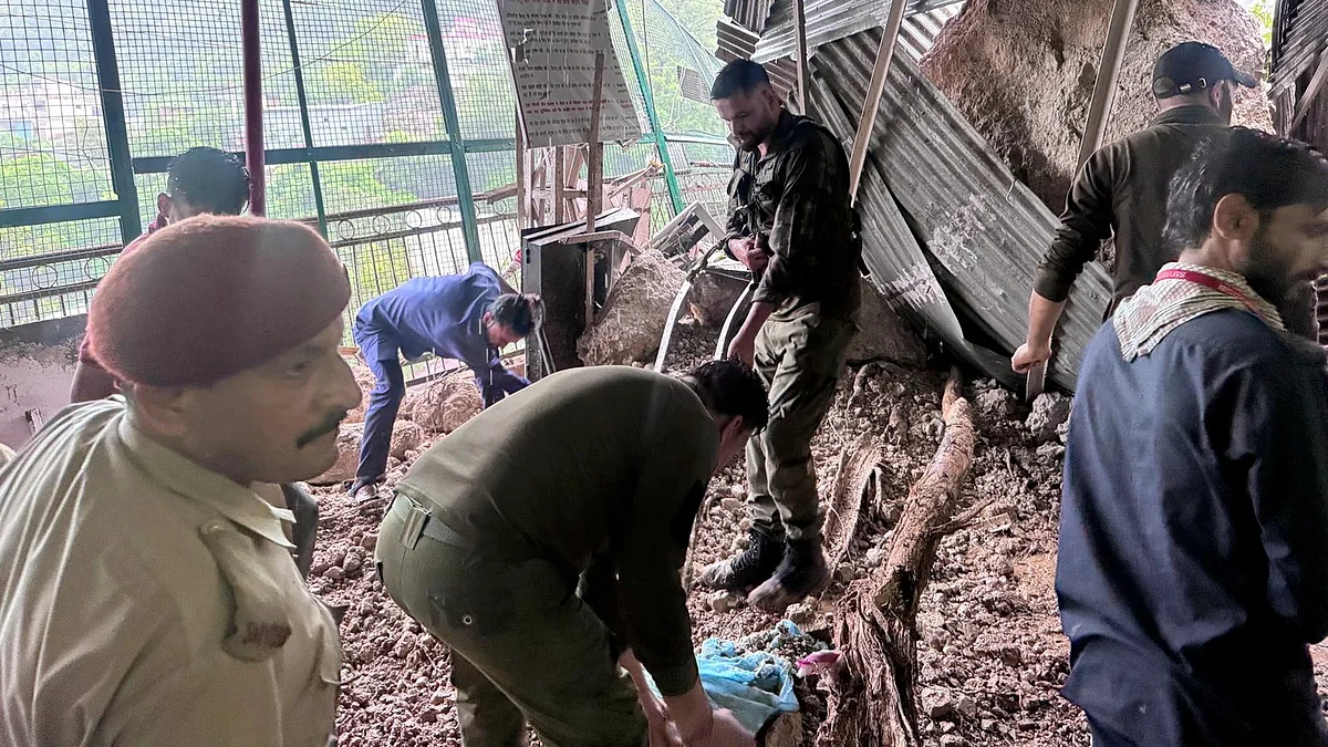 Police probe the scene in Reasi district on 21 July (photo: PTI)