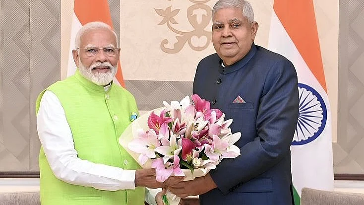 In healthier times: PM Narendra Modi and then-Vice-President Jagdeep Dhankhar