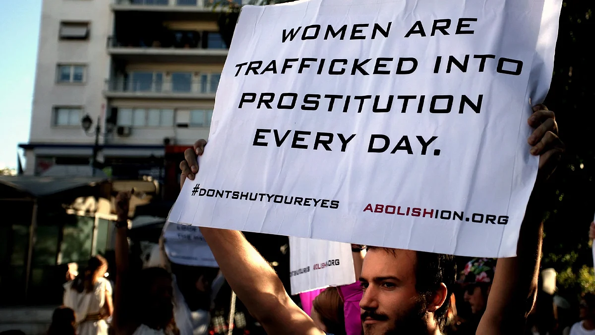 'Women are trafficked into prostitution every day' reads placard by EU non-profit Abolishion