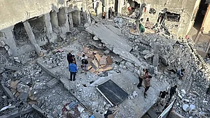 In the nave of the Holy Family Church in Gaza, after it was attacked by an IDF tank
