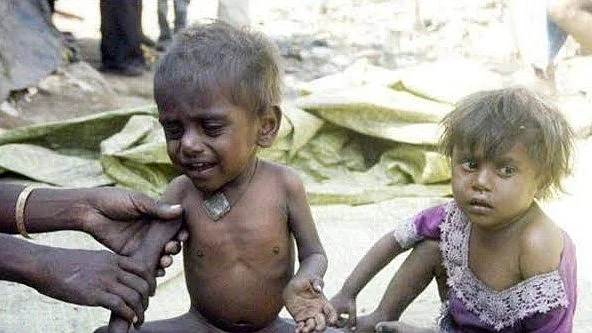 Why can't Mother India feed all her children, when we have enough to even export