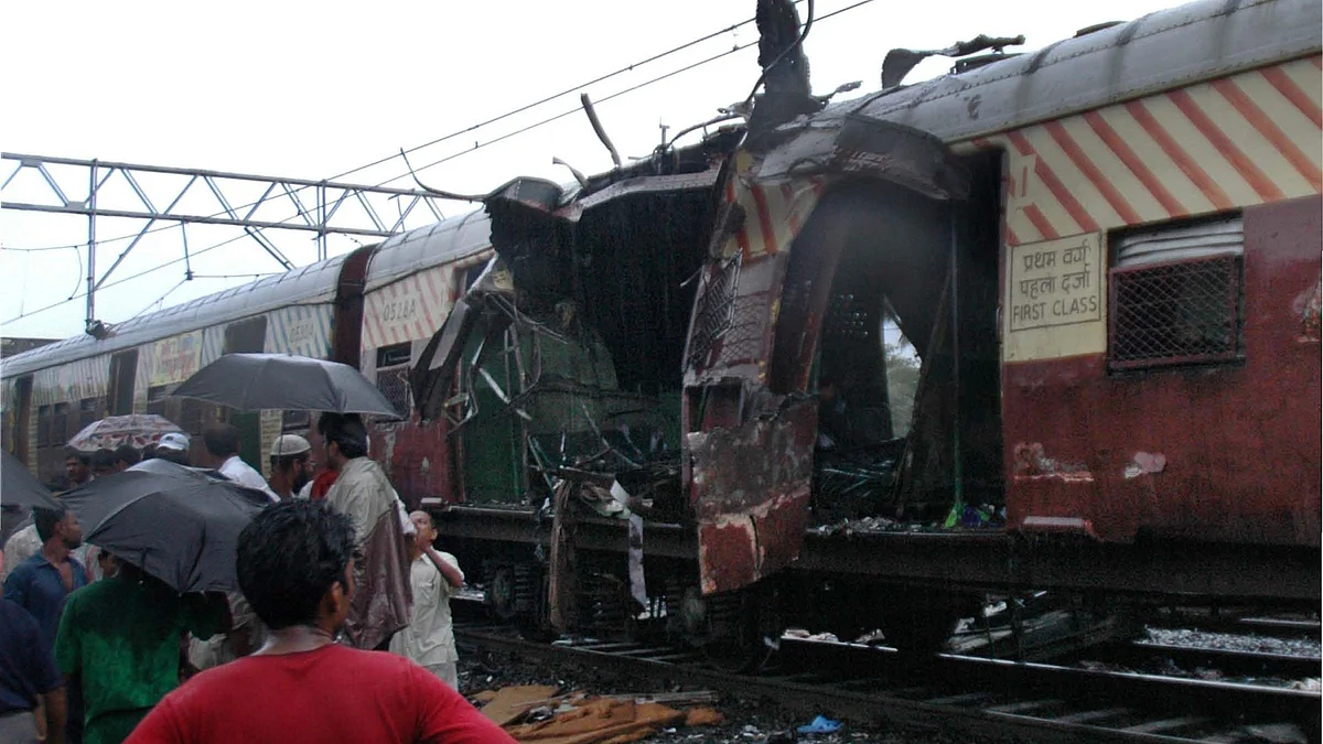 A train coach is damaged by 2006 bomb blast at Matunga railway station in Mumbai (NH file photo)