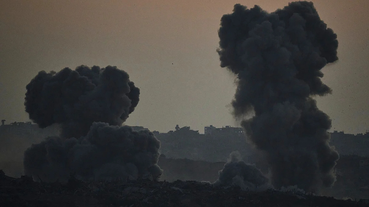 Smoke rises following an Israeli airstrike in Gaza Strip on 18 July (photo: AP/PTI)