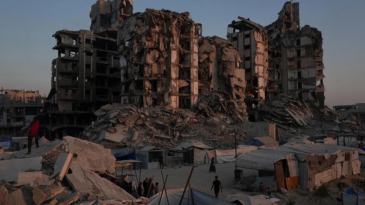 Buildings destroyed during Israeli air and ground operations in Gaza on 25 July (photo: AP/PTI)
