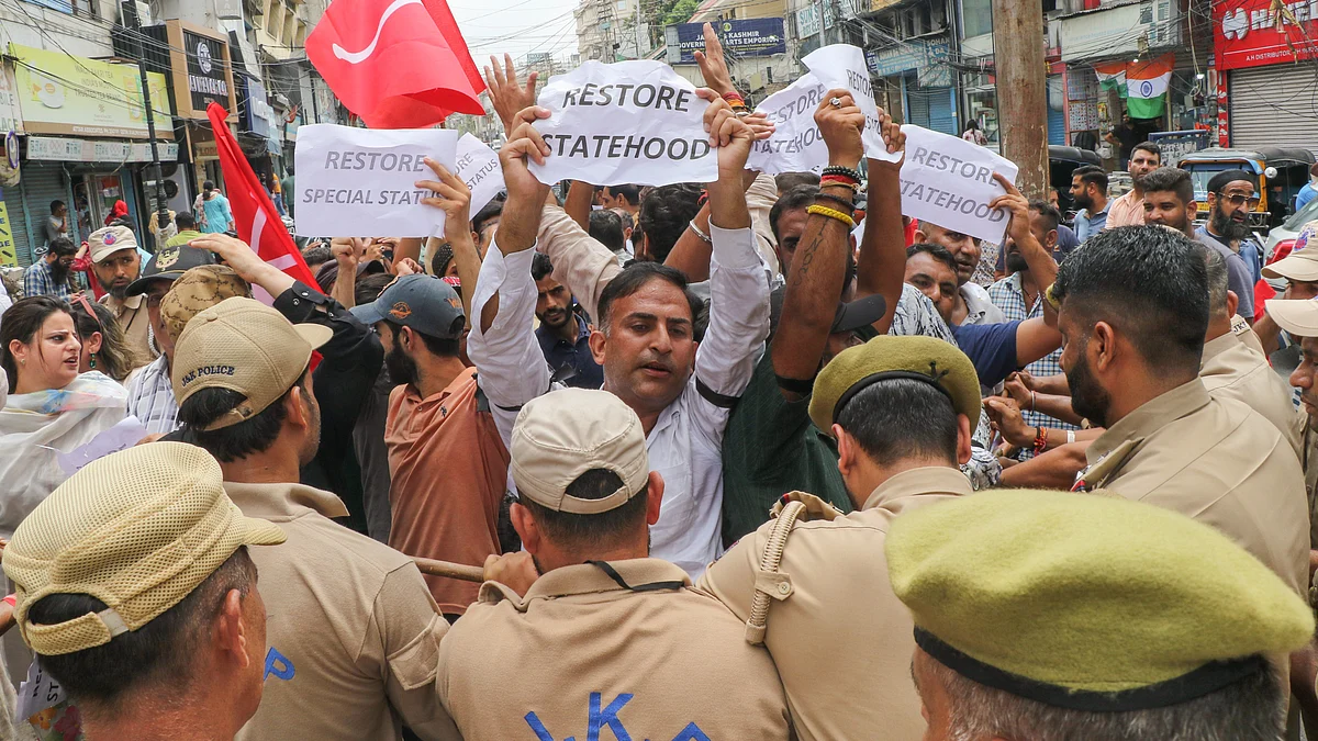 Political party leaders protest in Jammu in on 5 August (photo: PTI)