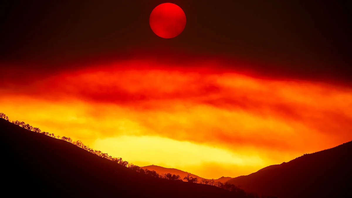 Smoke from Gifford Fire fills the sky as sun sets over Los Padres National Forest on 4 August (AP/PTI)