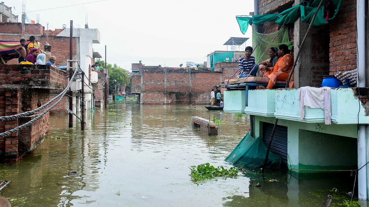 Partially submerged houses in Varanasi on 6 August (photo: PTI)