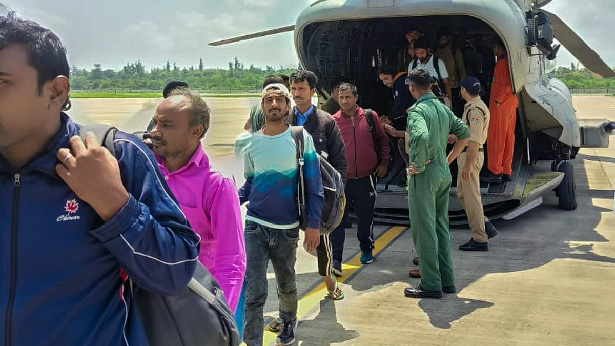 Rescued people being brought to Jolly Grant Airport in Dehradun on 7 August