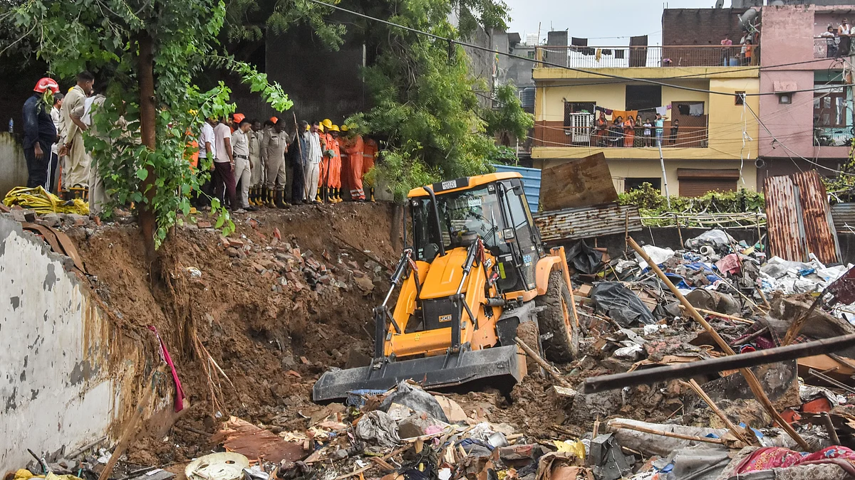 A wall collapsed in Delhi's Jaitpur after heavy rains lashed the city, 9 Aug 2025 (photo: PTI)