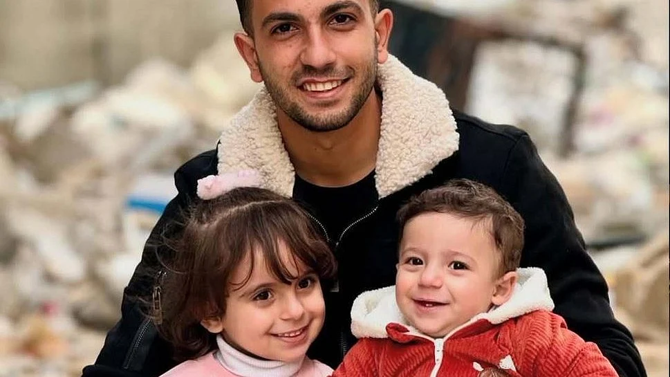 Anas al-Sharif, killed in a targeted airstrike by Israel, with his children at their last reunion
