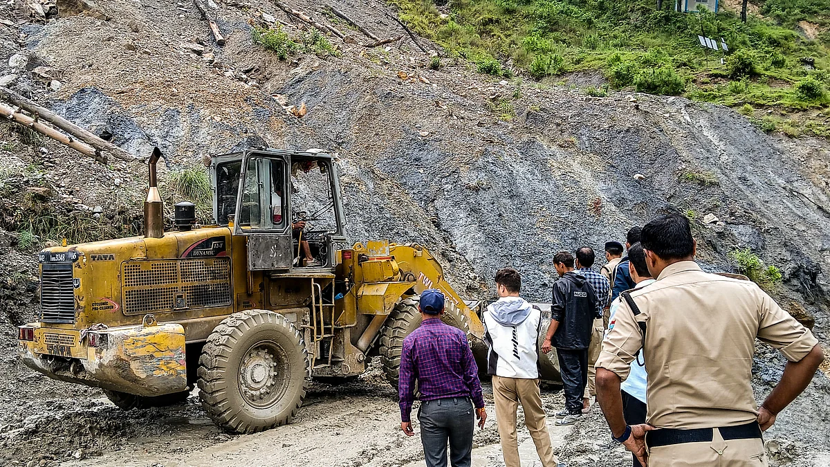 Debris being removed amid restoration work in Uttarkashi on 11 August