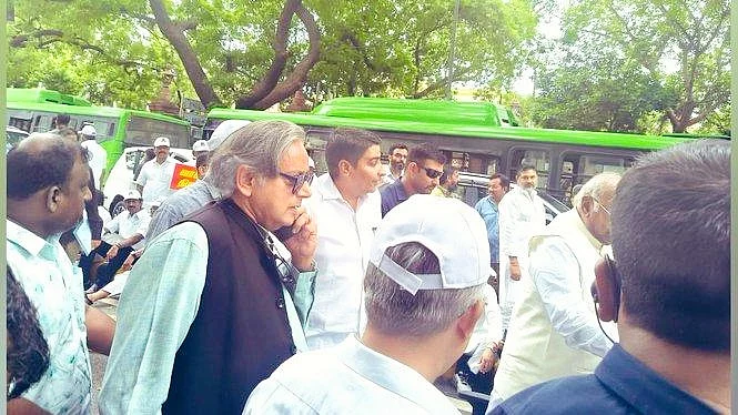 Shashi Tharoor in the Opposition march to the EC office