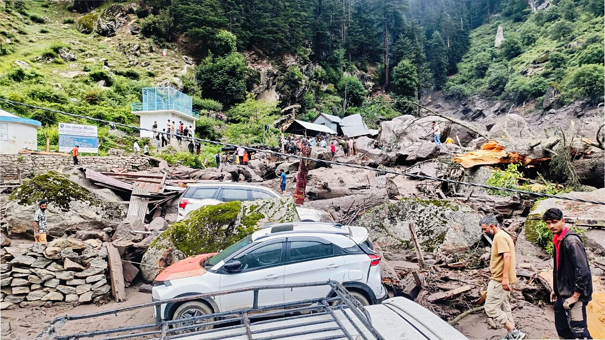 Damaged structures and uprooted trees after the massive cloudburst at Chishoti