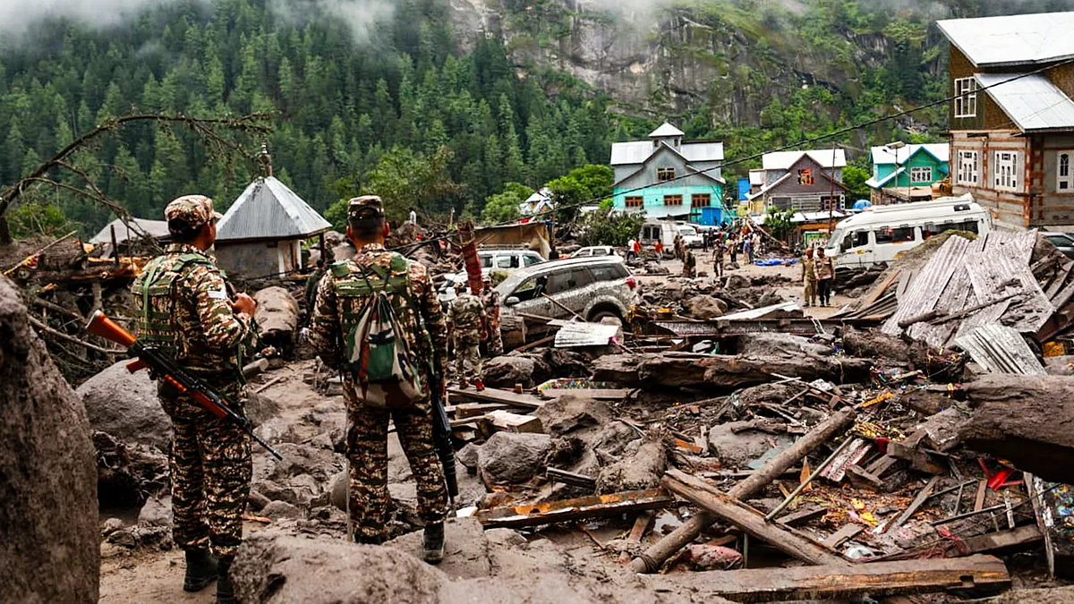 Security personnel amidst the debris in Kishtwar 