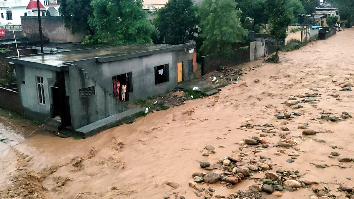 Debris and mud accumulated in a residential area in Kathua on 17 August
