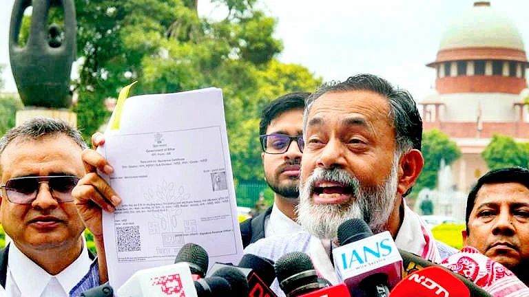 Yogendra Yadav speaks to media outside the Supreme Court