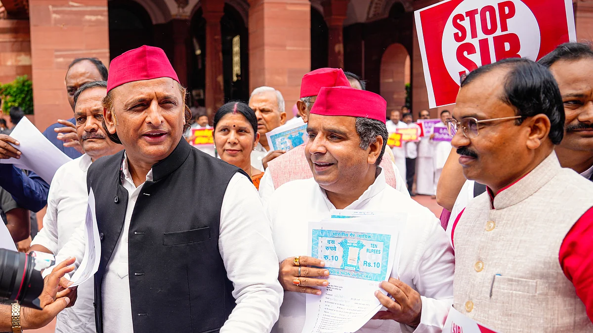 SP MPs Akhilesh Yadav and Dharmendra Yadav and other INDIA bloc MPs protest the Bihar SIR in Parliament