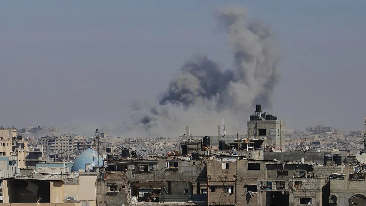 Smoke rises following an Israeli airstrike in Khan Younis on 18 August
