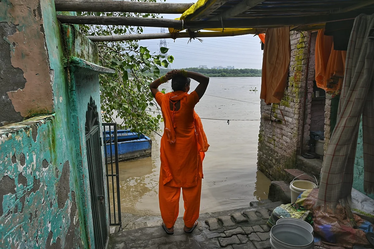 To walk or to wade, that is the question for this denizen of Delhi on the riverbank of the Yamuna