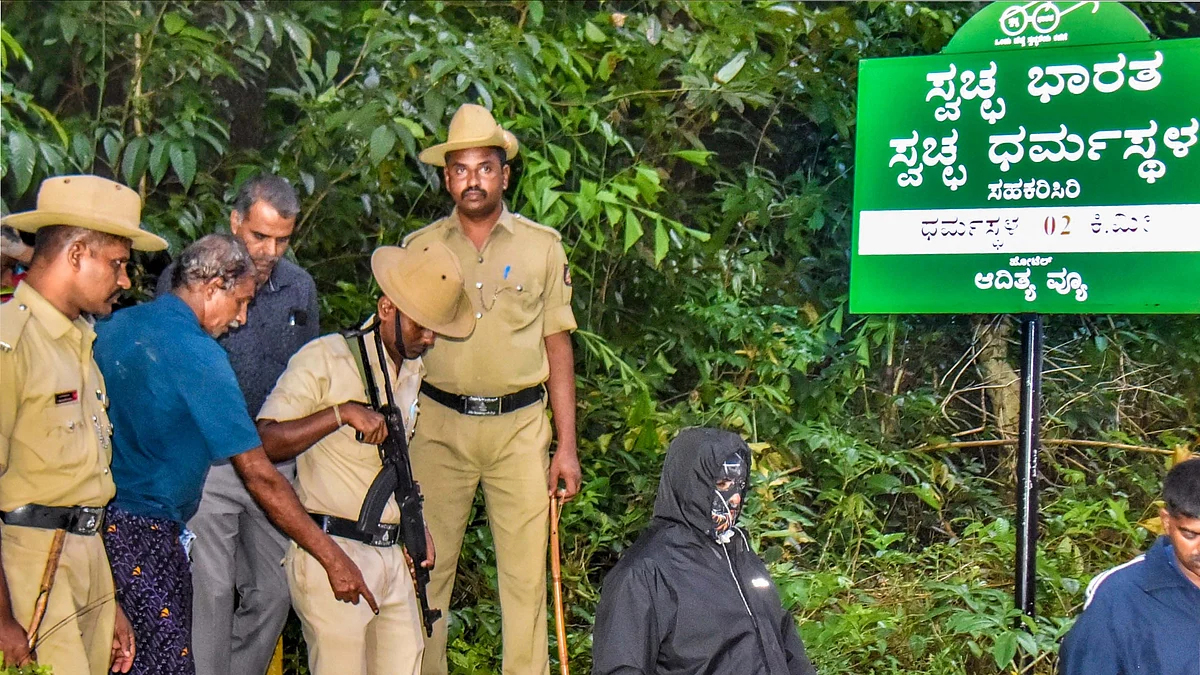 The complainant (masked) at one burial site. (File photo: PTI)