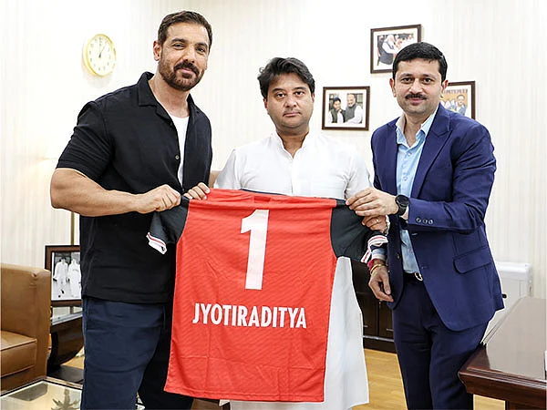 John Abraham with Jyotiraditya Scindia and NUFC CEO Mandar Tamhane