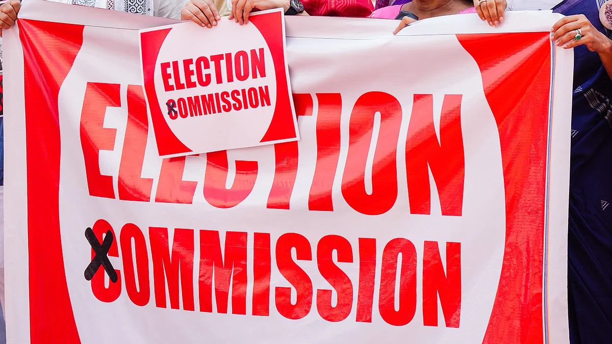 A banner at a protest against the Election Commission outside Parliament, 19 Aug