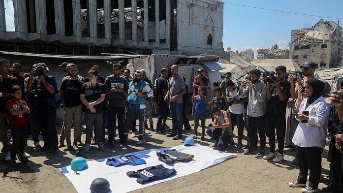Locals mourn the death of journalists in Gaza