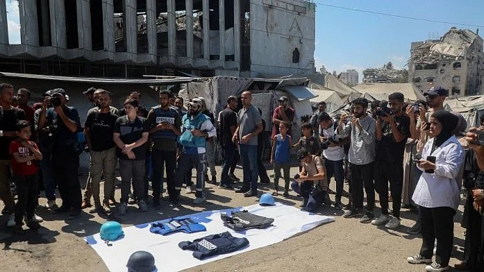 Locals mourn the death of journalists in Gaza