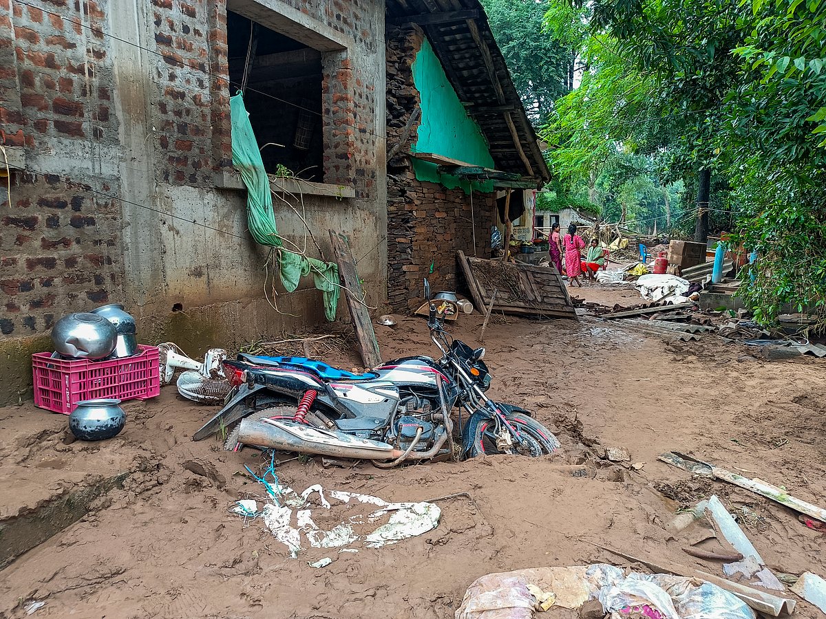 A vehicle stuck in debris following heavy rainfall, in Bastar, 27 August 2025