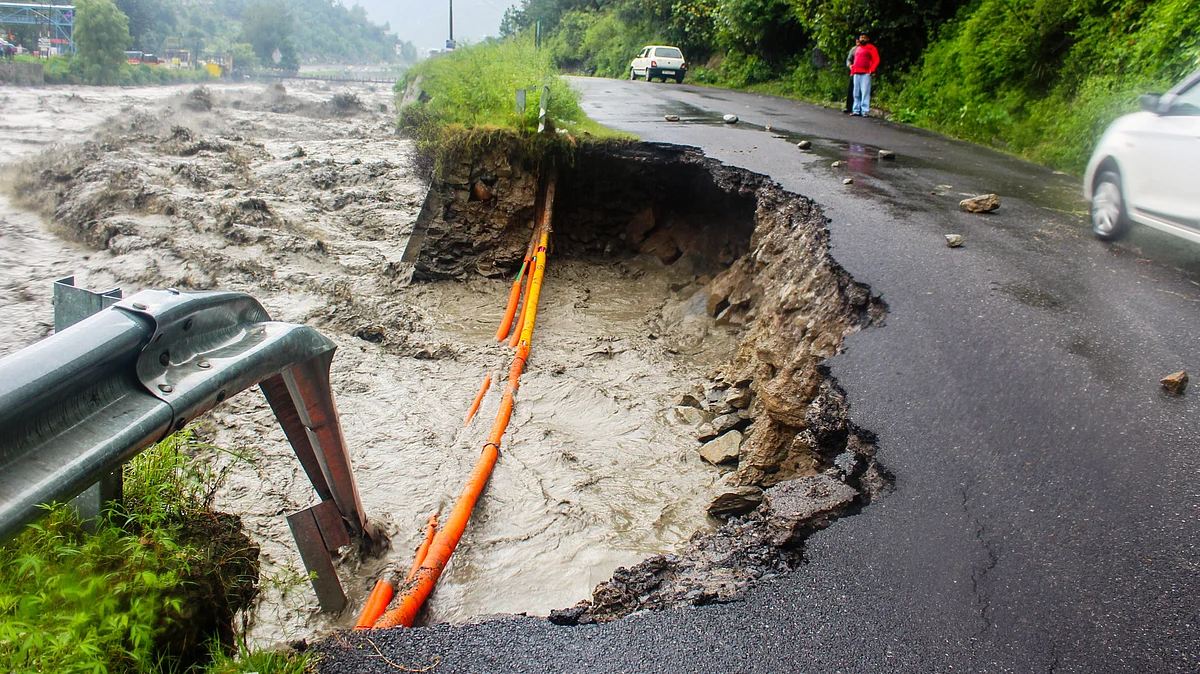 A portion of the Chandigarh-Manali highway washed away by the Beas, 26 Aug